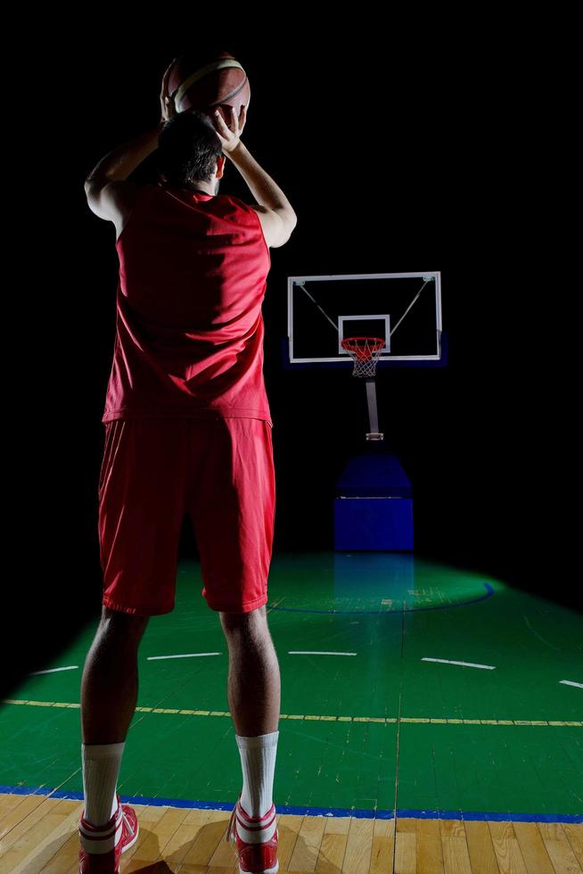 jugador de baloncesto en acción foto