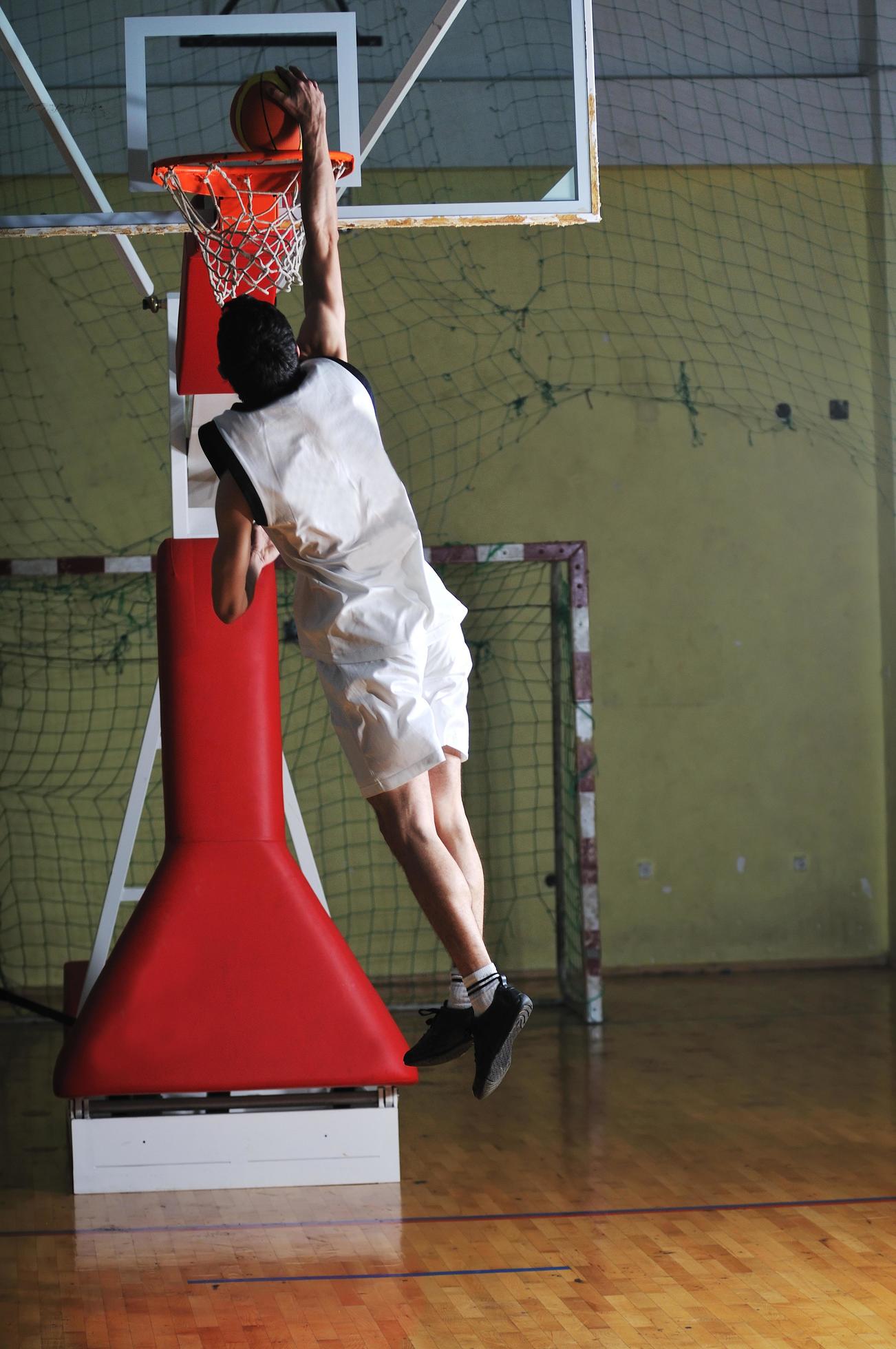basket ball game player at sport hall 12645285 Stock Photo at Vecteezy