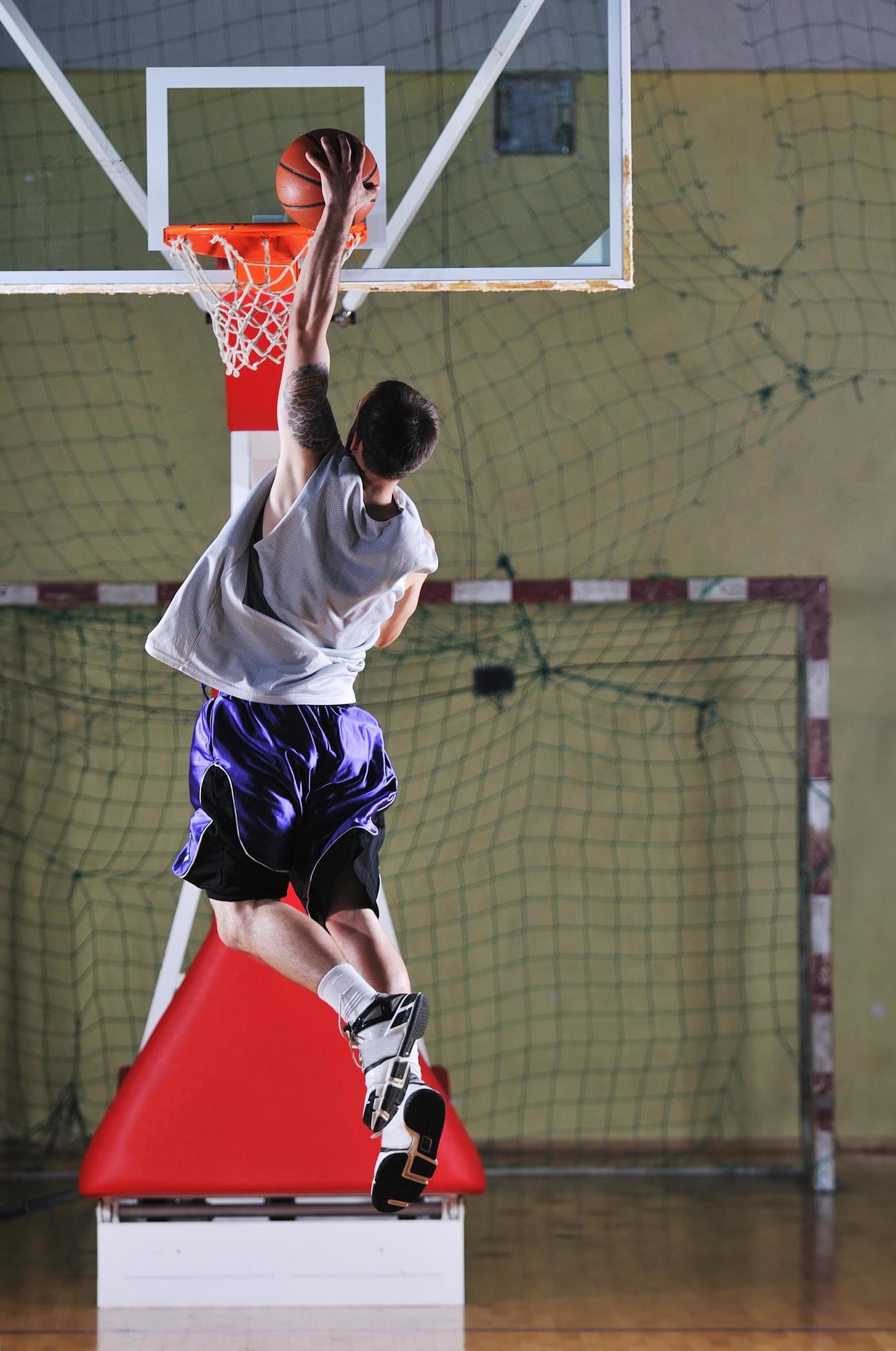 basket ball game player at sport hall 12645297 Stock Photo at Vecteezy
