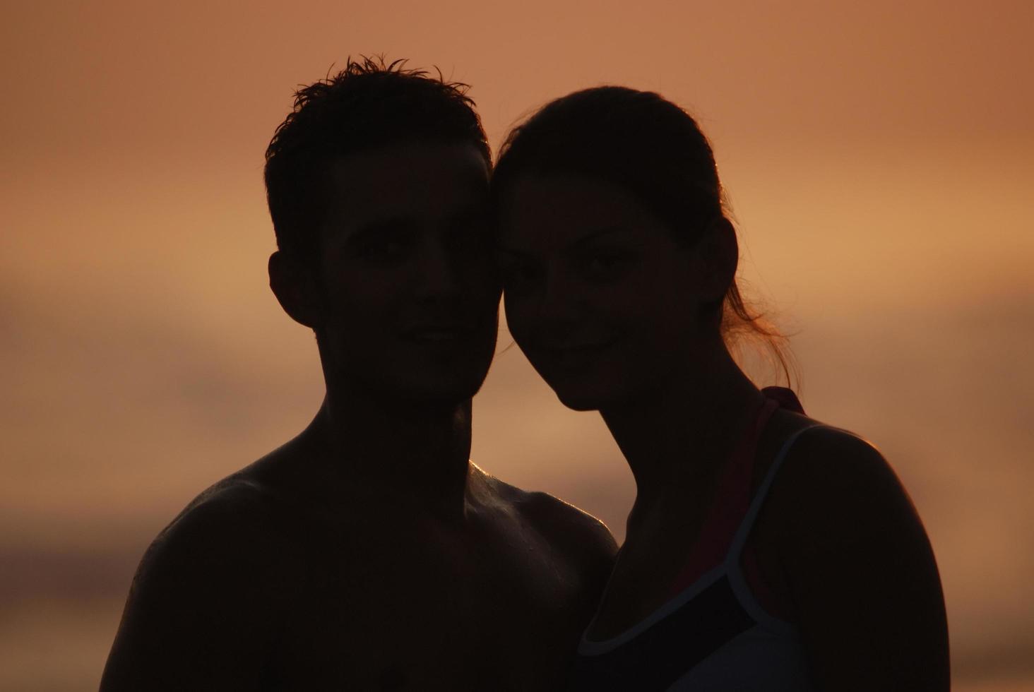 romantic couple on beach photo