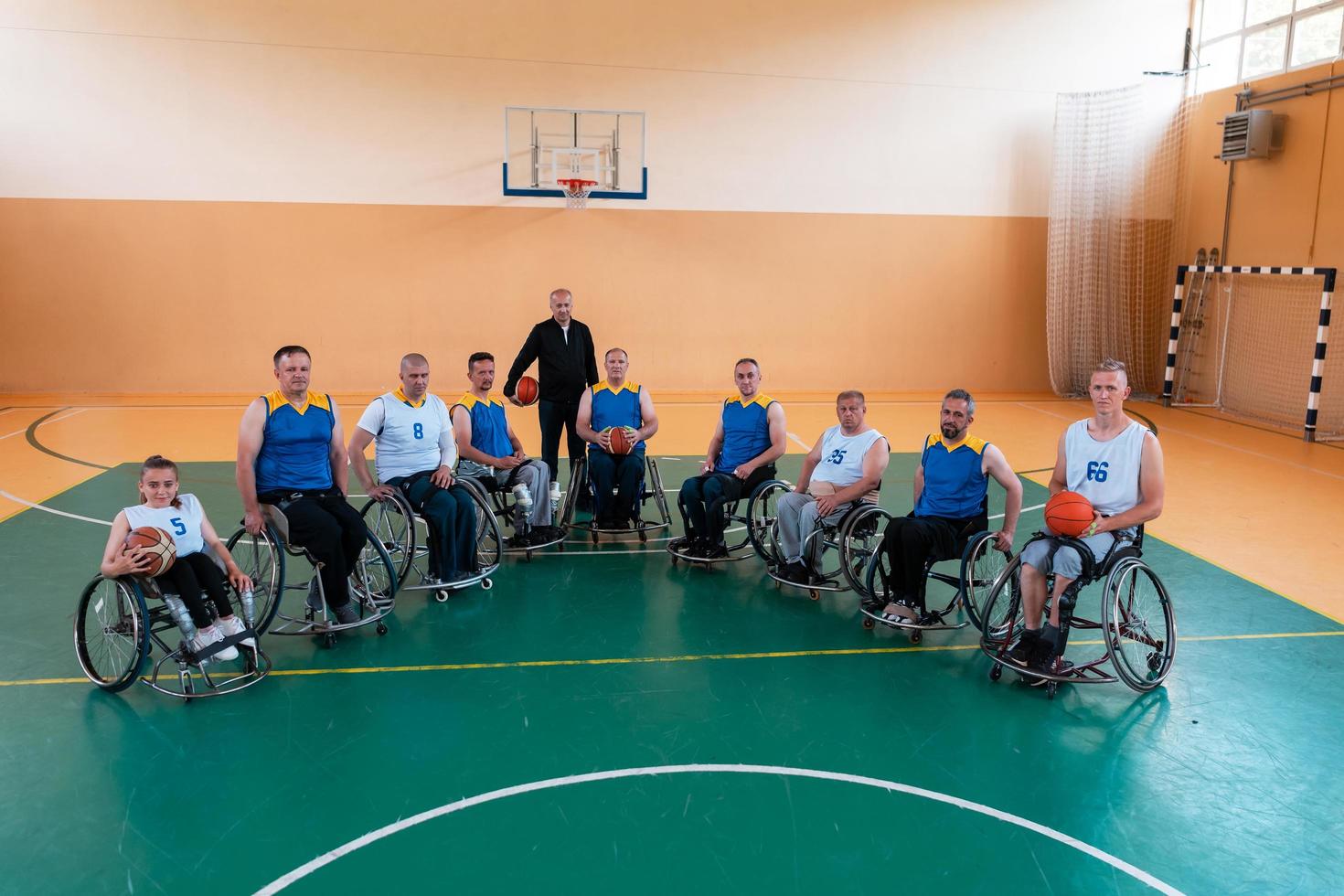 a photo of basketball teams with disabilities with the selector in the big hall before the start of the basketball game