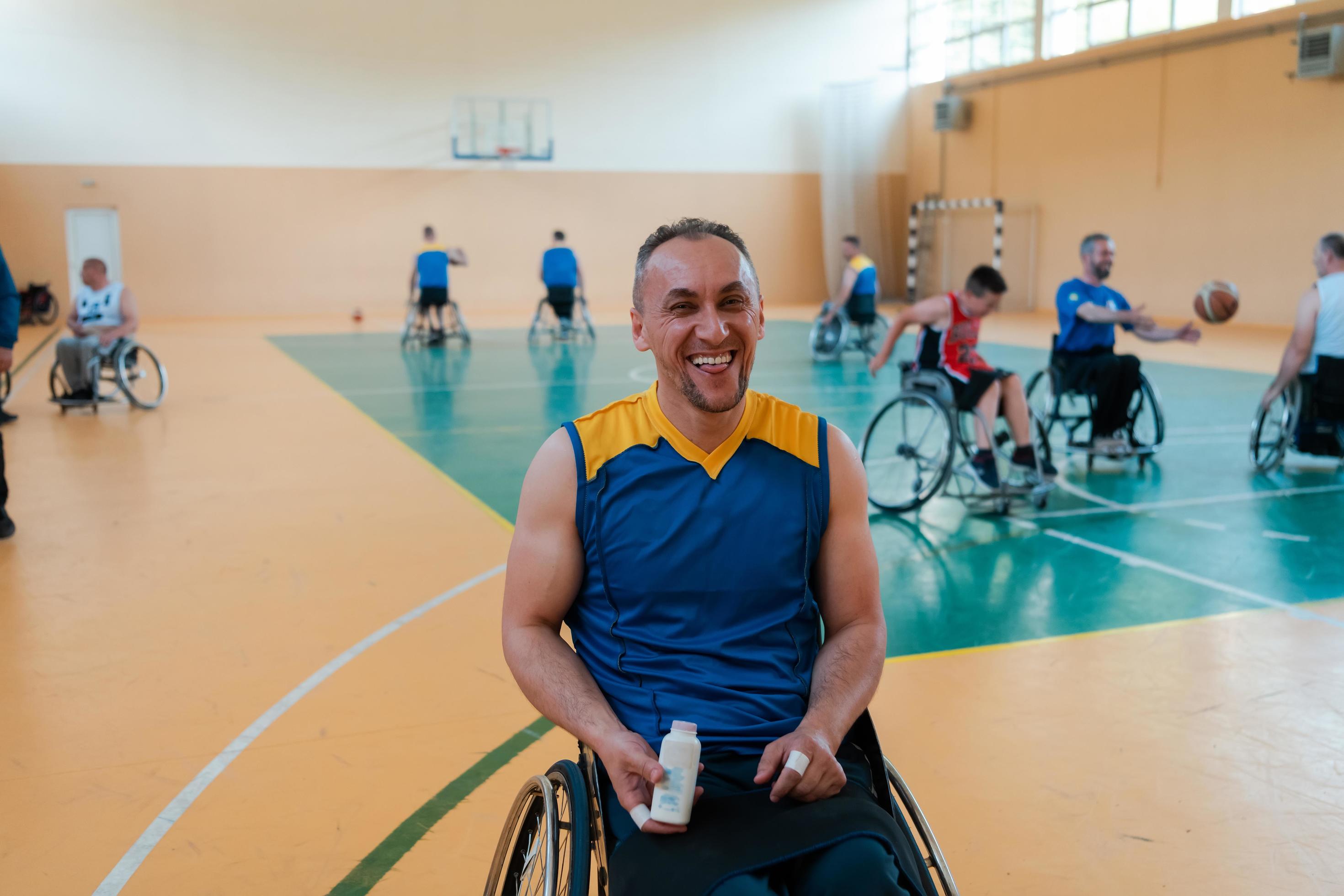 a basketball player puts antislip powder before the start of a