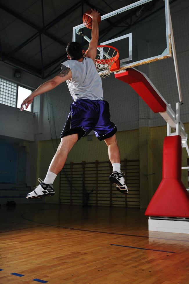 basket ball game player at sport hall photo