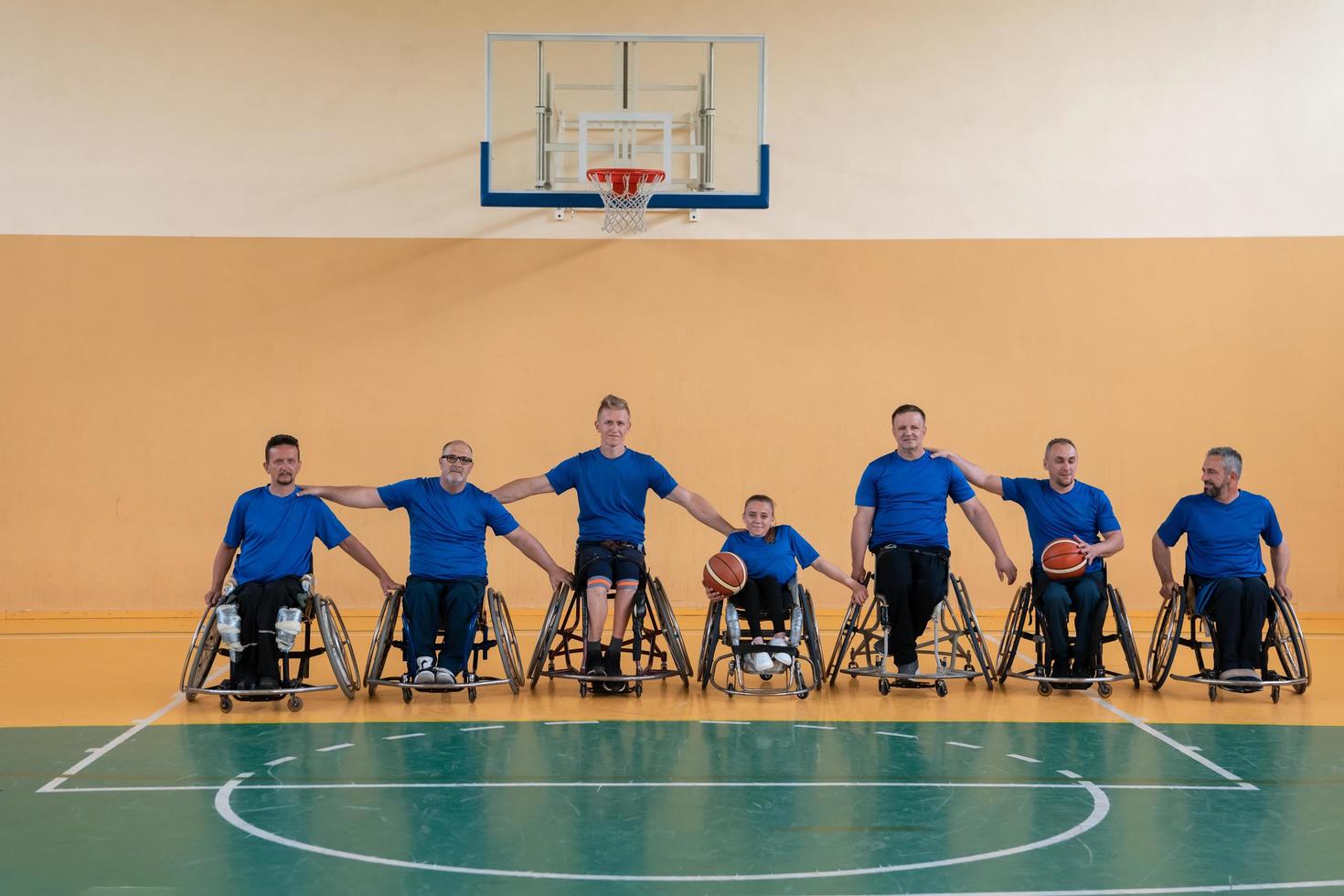 photo of the basketball team of war invalids with professional sports equipment for people with disabilities on the basketball court