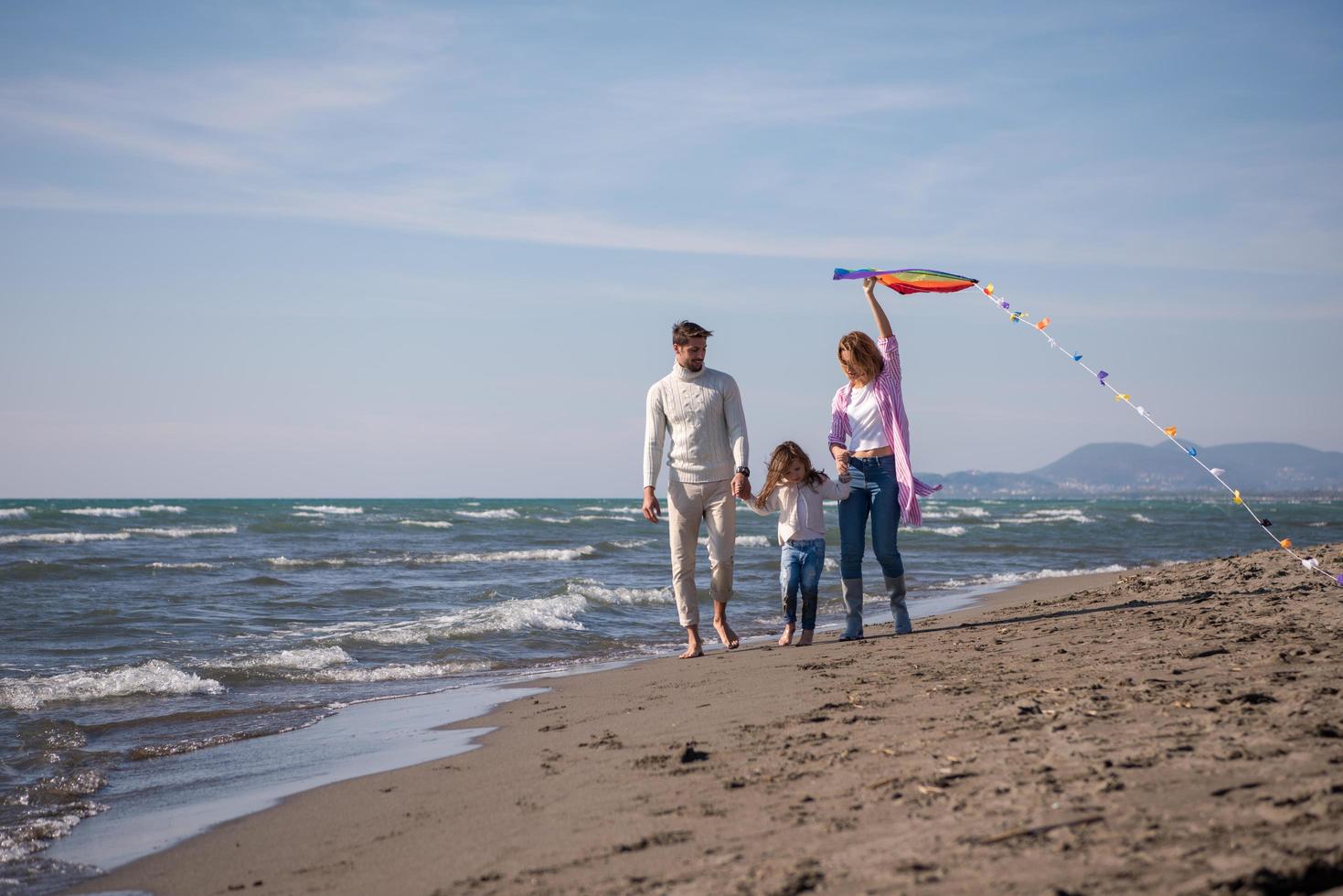 happy family enjoying vecation during autumn day photo