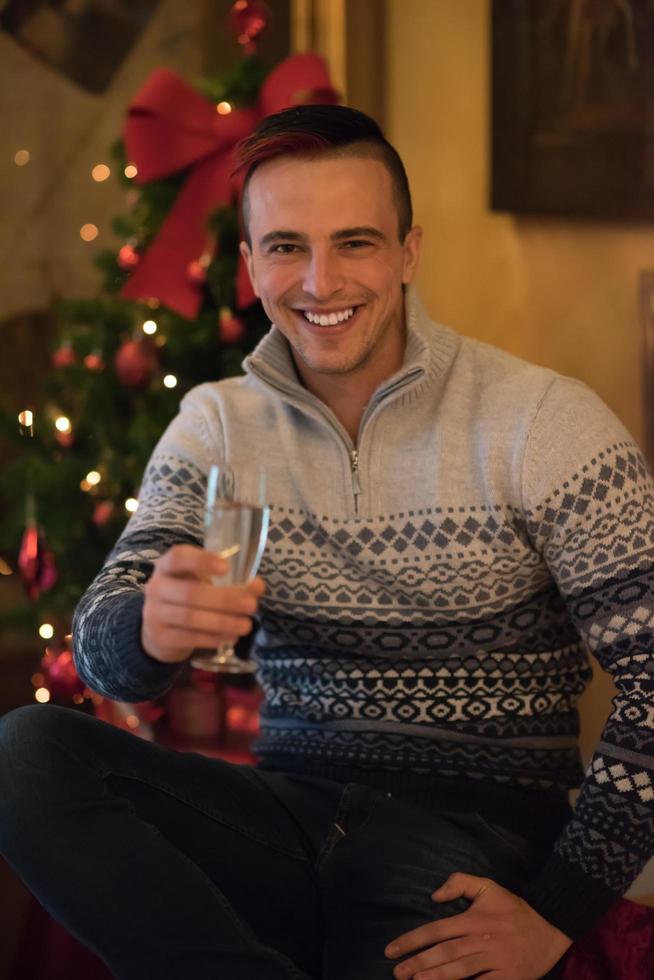 young man with champagne glass  on party photo