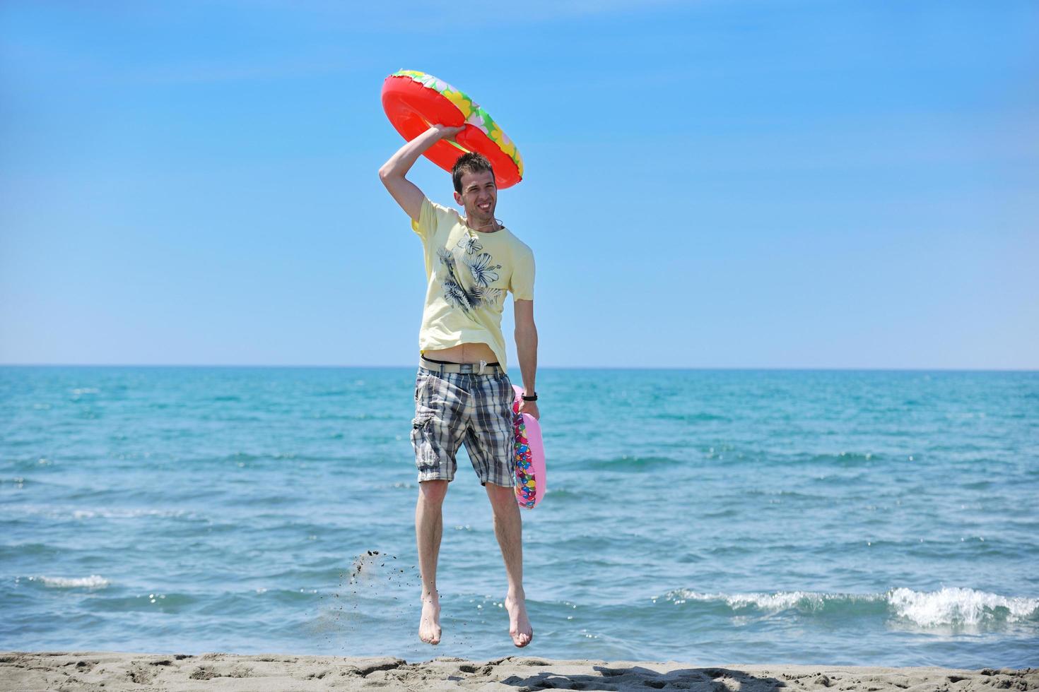 man relax on beach photo