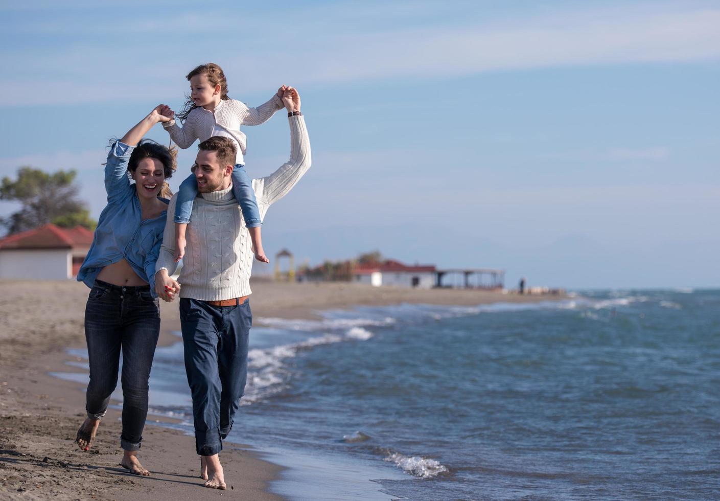 Young family enjoying vecation during autumn photo