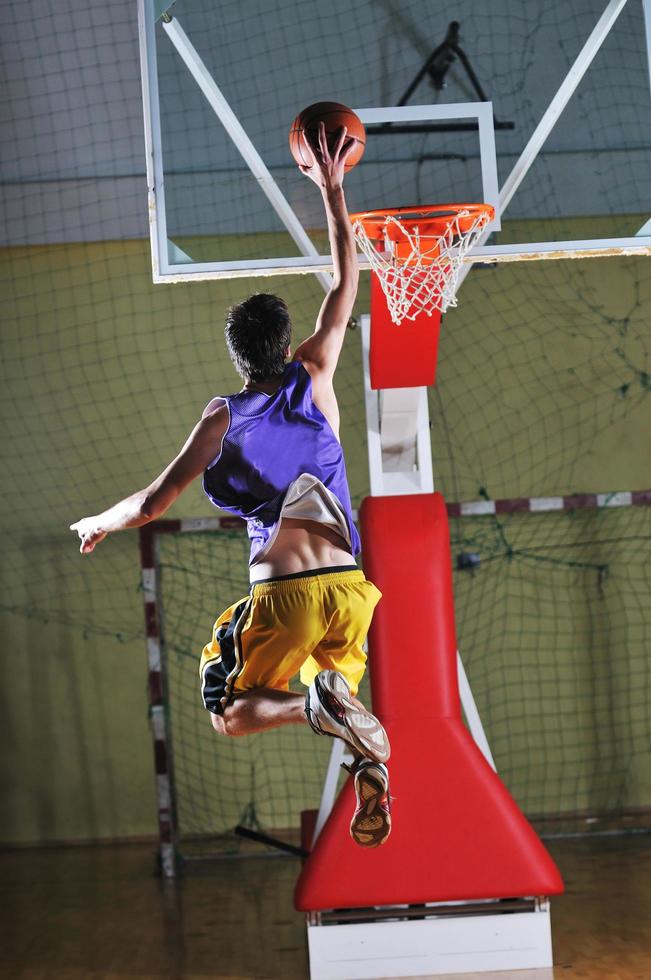 basket ball game player at sport hall 12649449 Stock Photo at Vecteezy