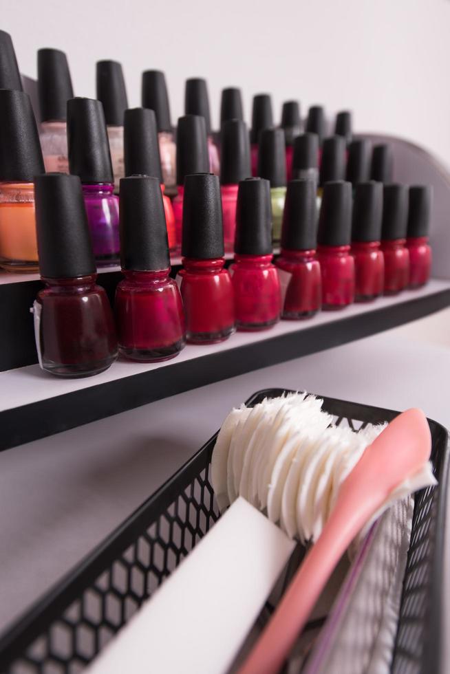 Set of different bottles of nail polish photo