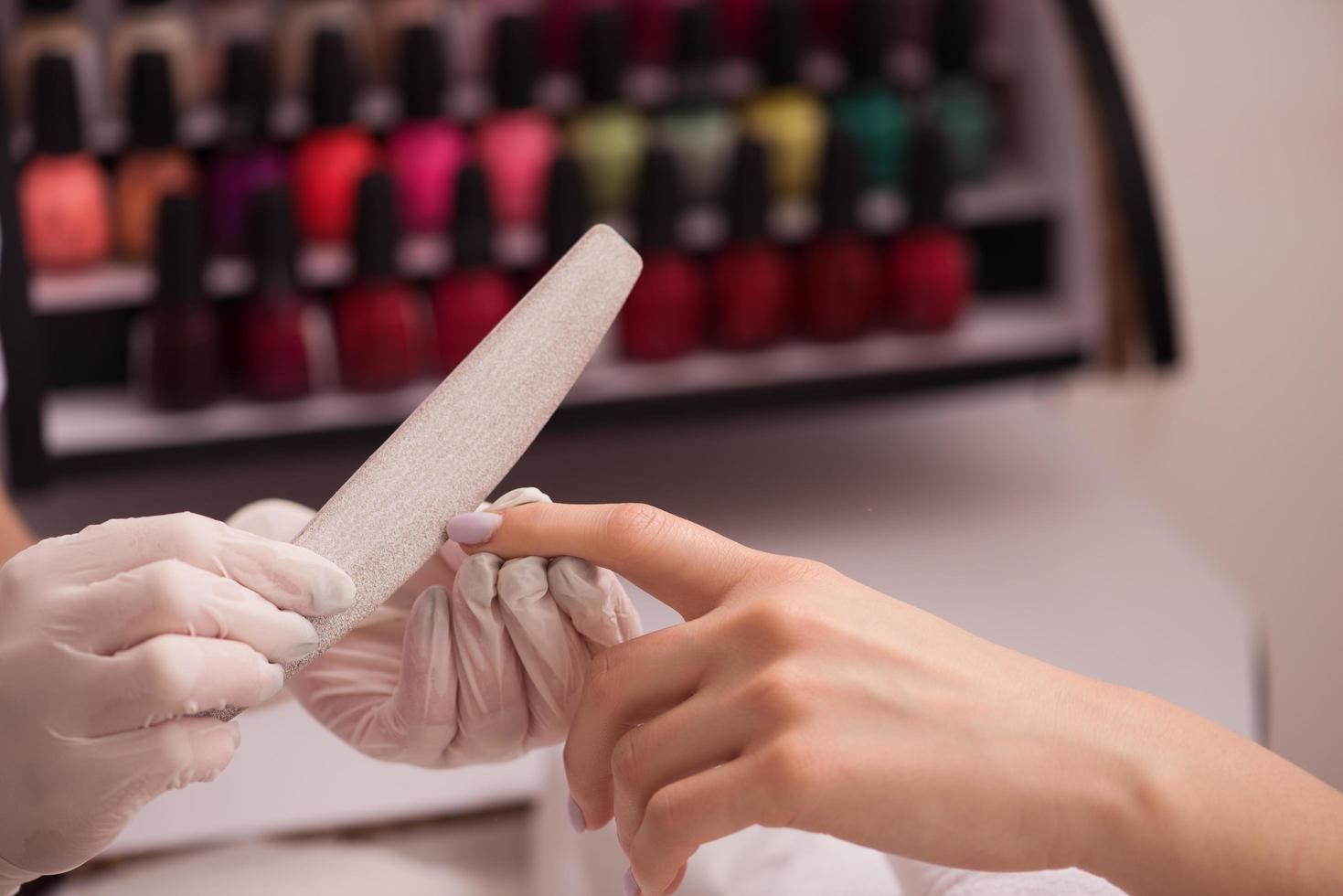 Woman hands receiving a manicure photo