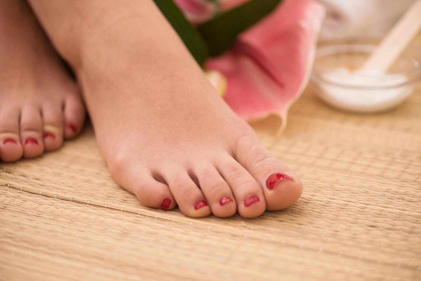 female feet at spa salon photo