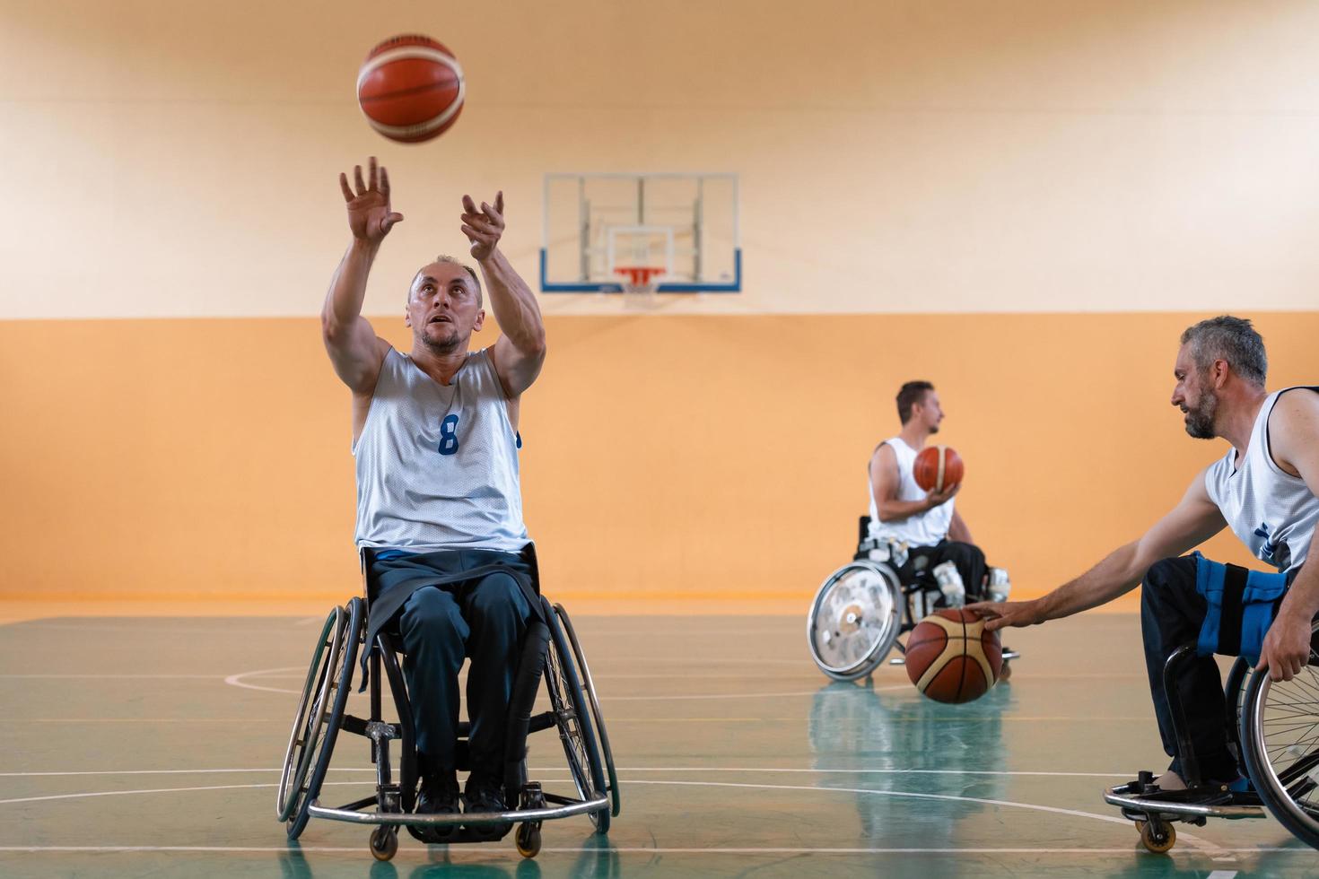 a photo of a war veteran playing basketball with a team in a modern sports arena. The concept of sport for people with disabilities