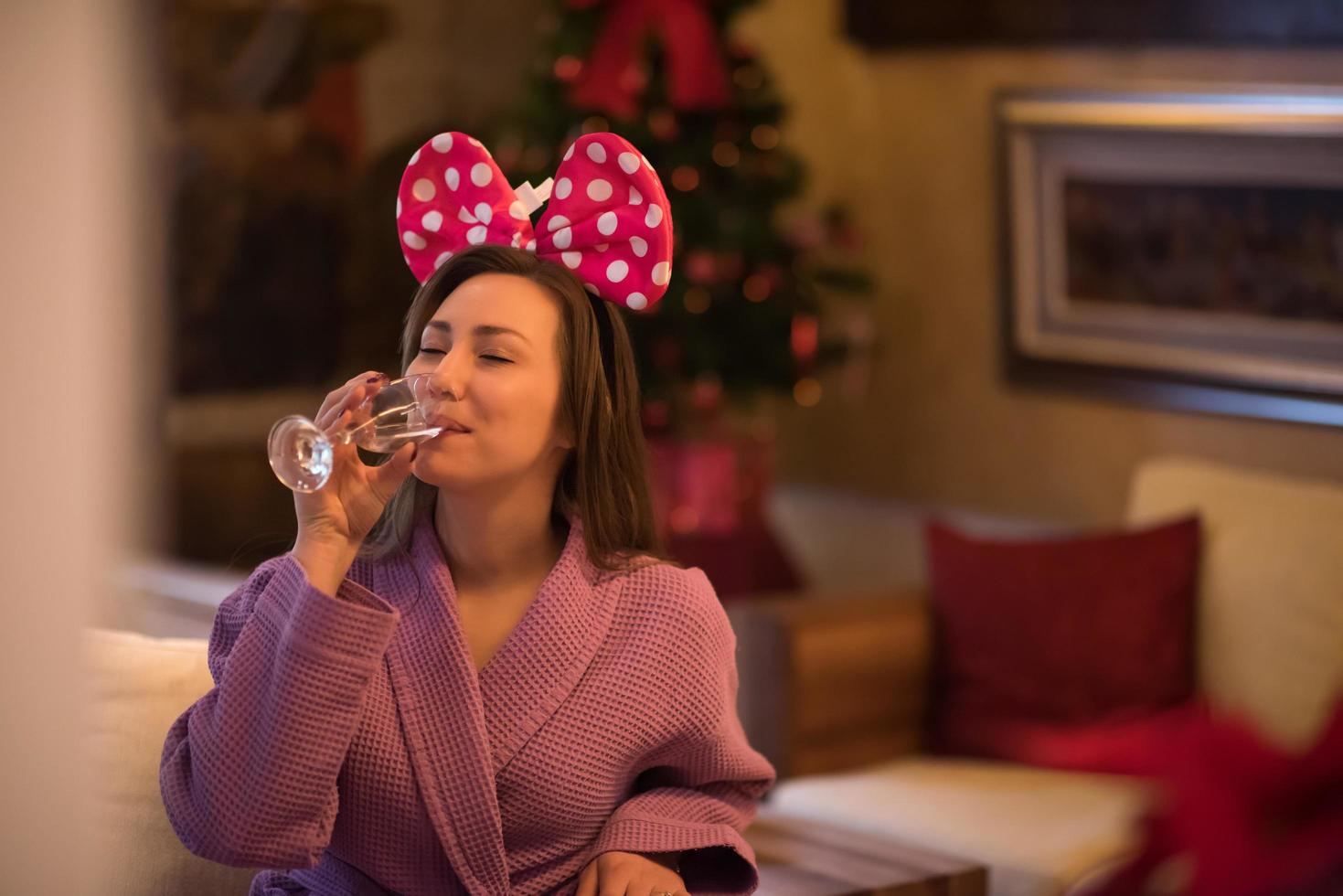 woman drinking champagne at spa photo