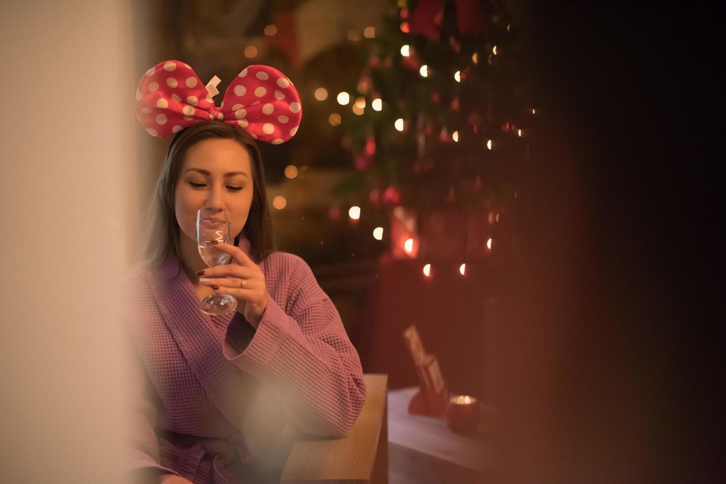 woman drinking champagne at spa photo