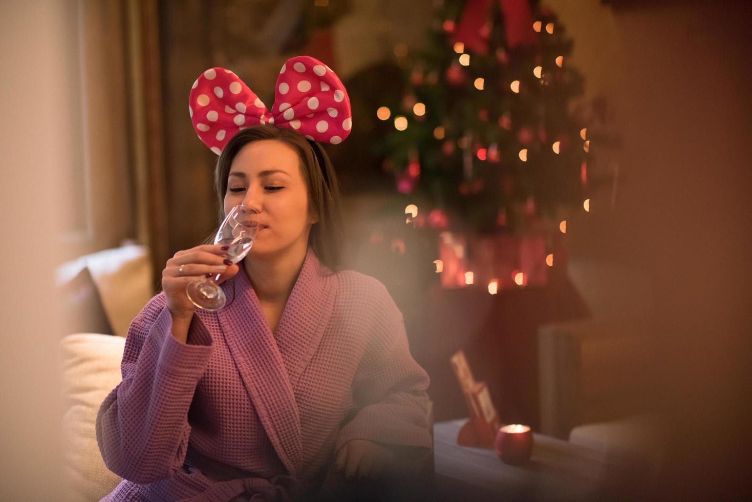 woman drinking champagne at spa photo