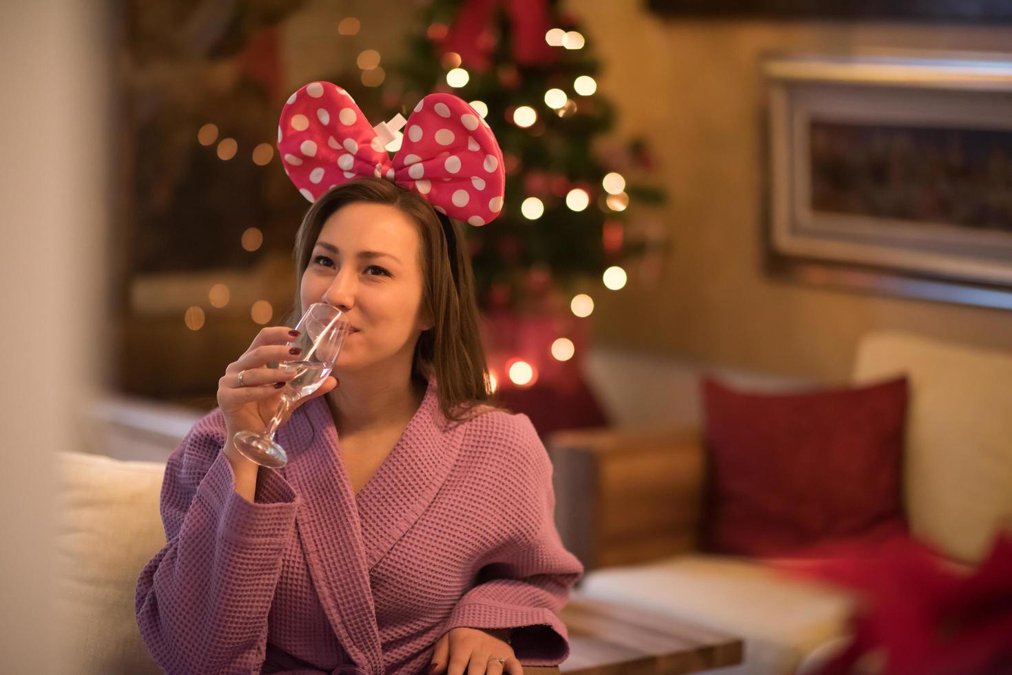 woman drinking champagne at spa photo