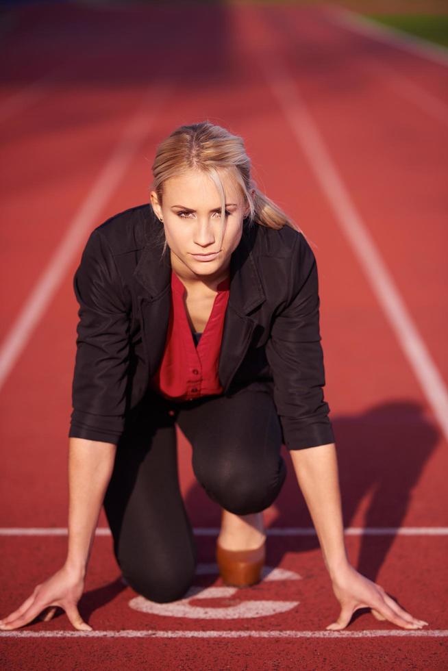 business woman ready to sprint photo