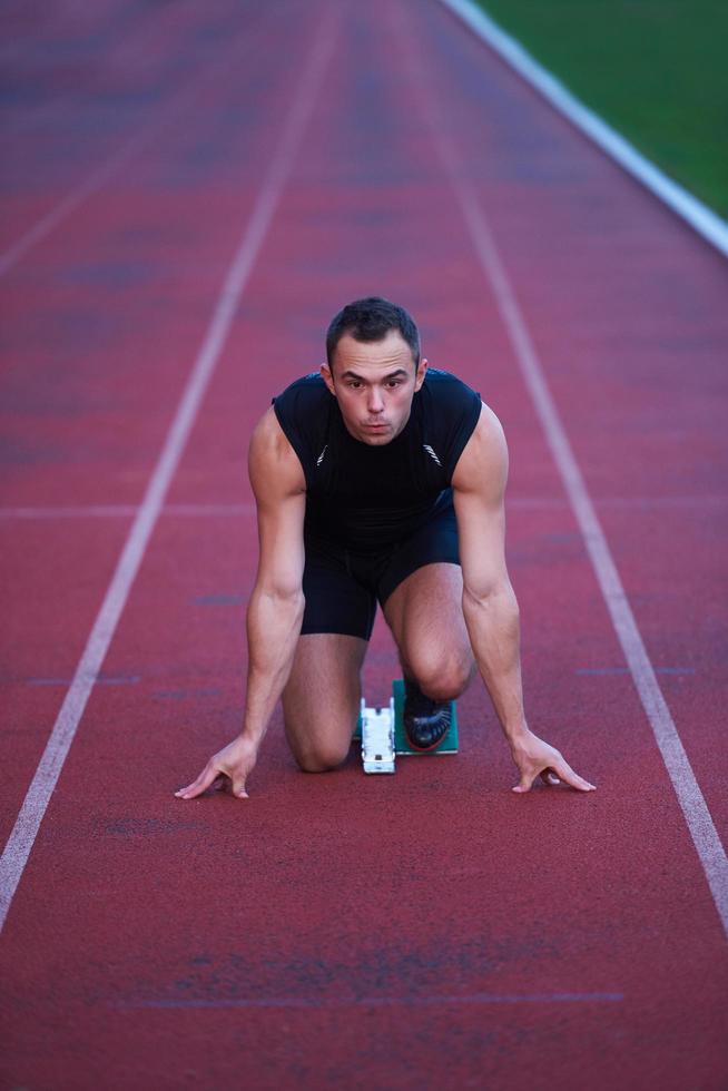 Athletic man start photo