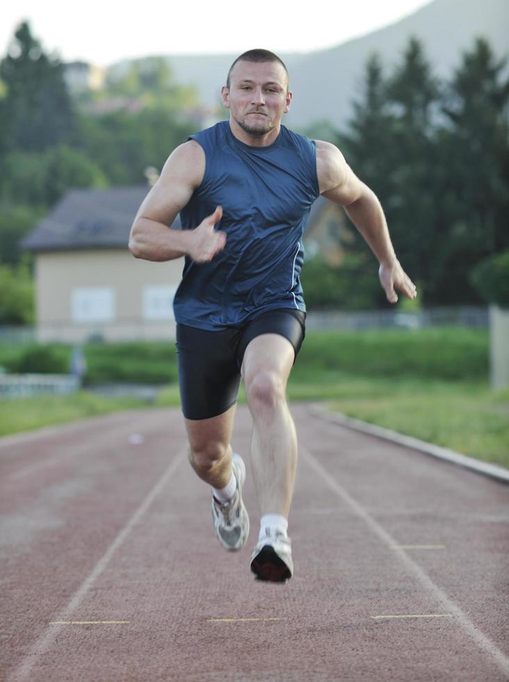 young athlete running photo