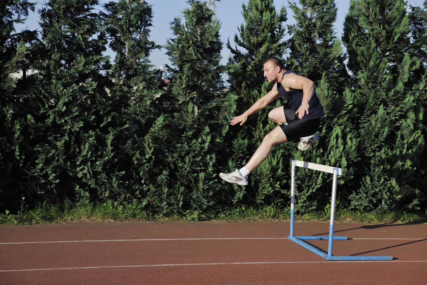 young athlete running photo