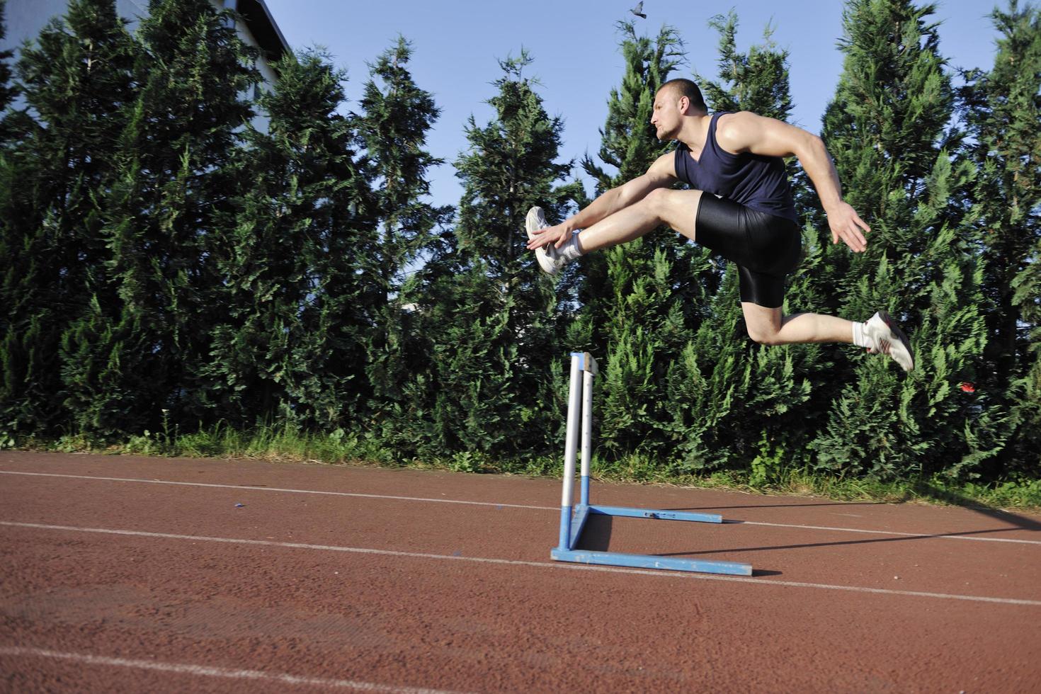 young athlete running photo