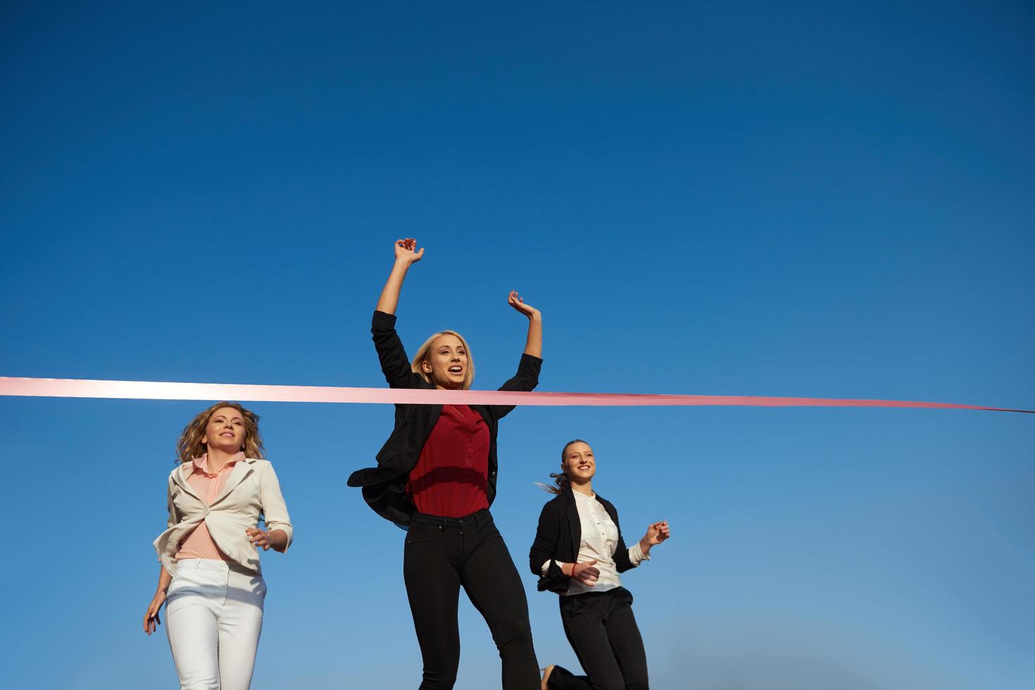 business people running on racing track photo