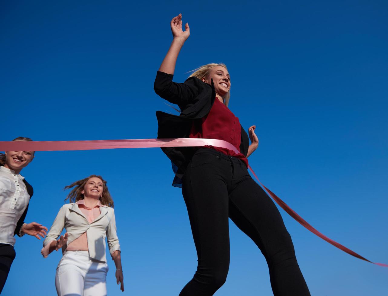 business people running on racing track photo