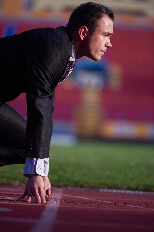 business man ready to sprint photo