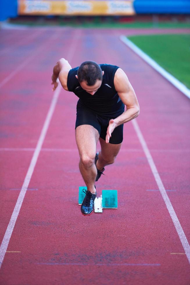 Athletic man start photo