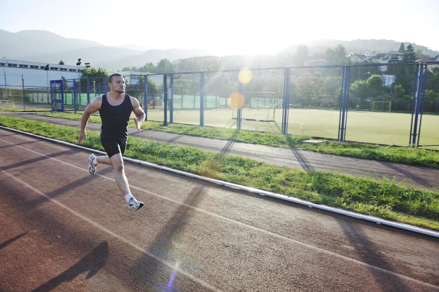 young athlete running photo