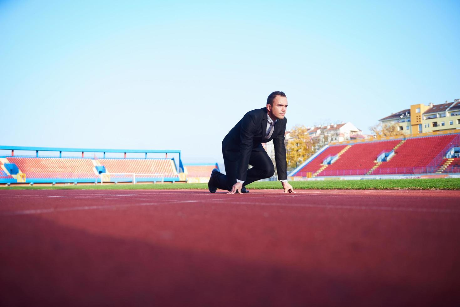 business man ready to sprint photo