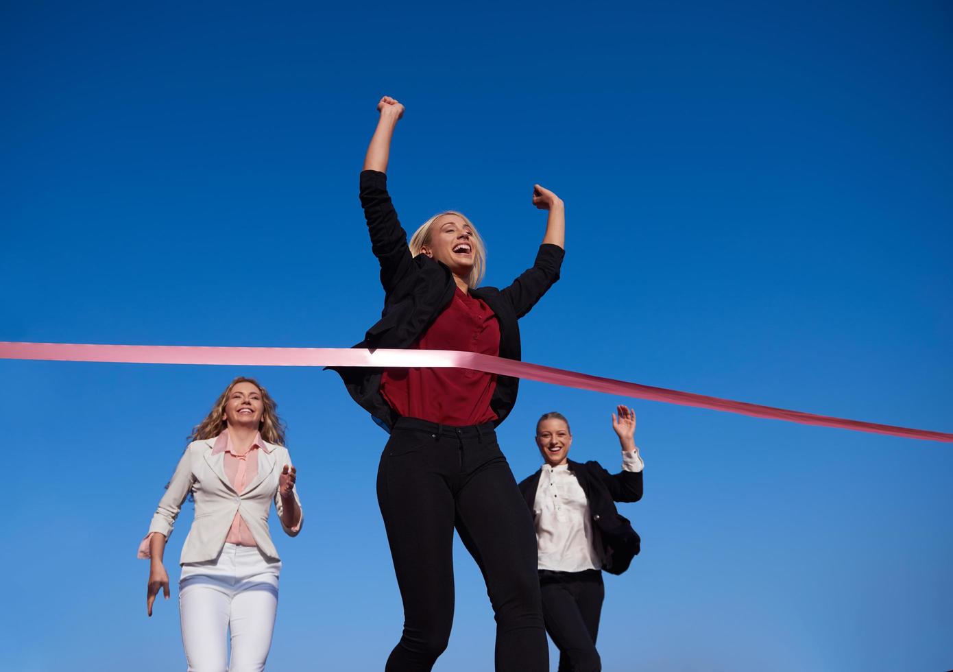 business people running on racing track photo