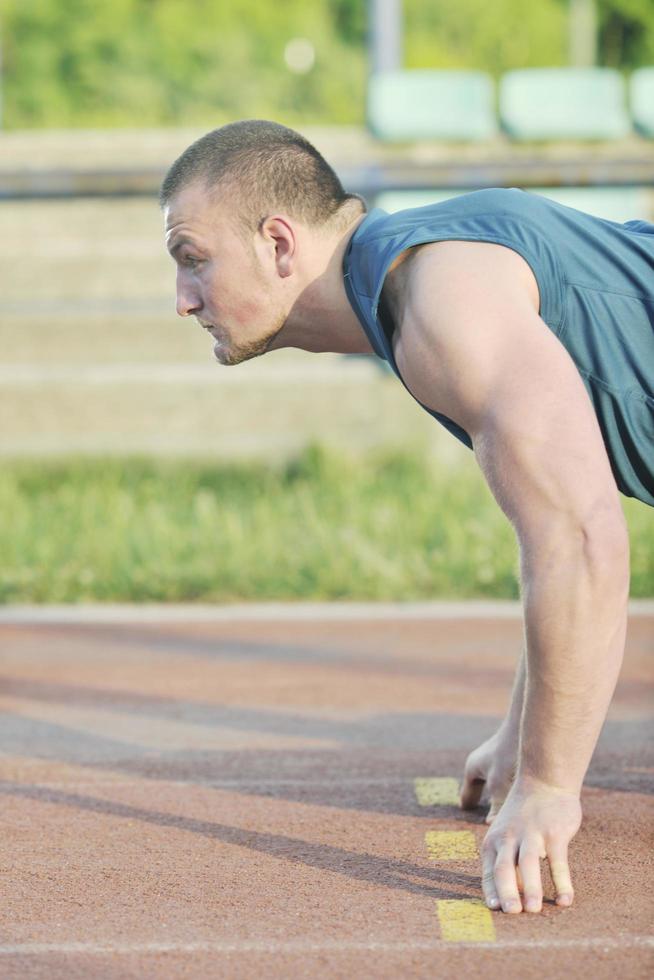 young athlete on start photo