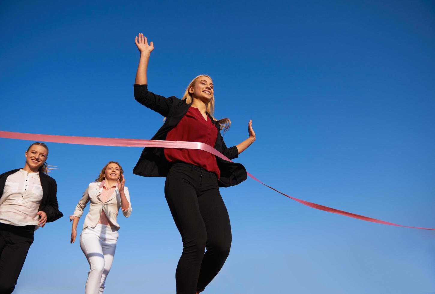 business people running on racing track photo
