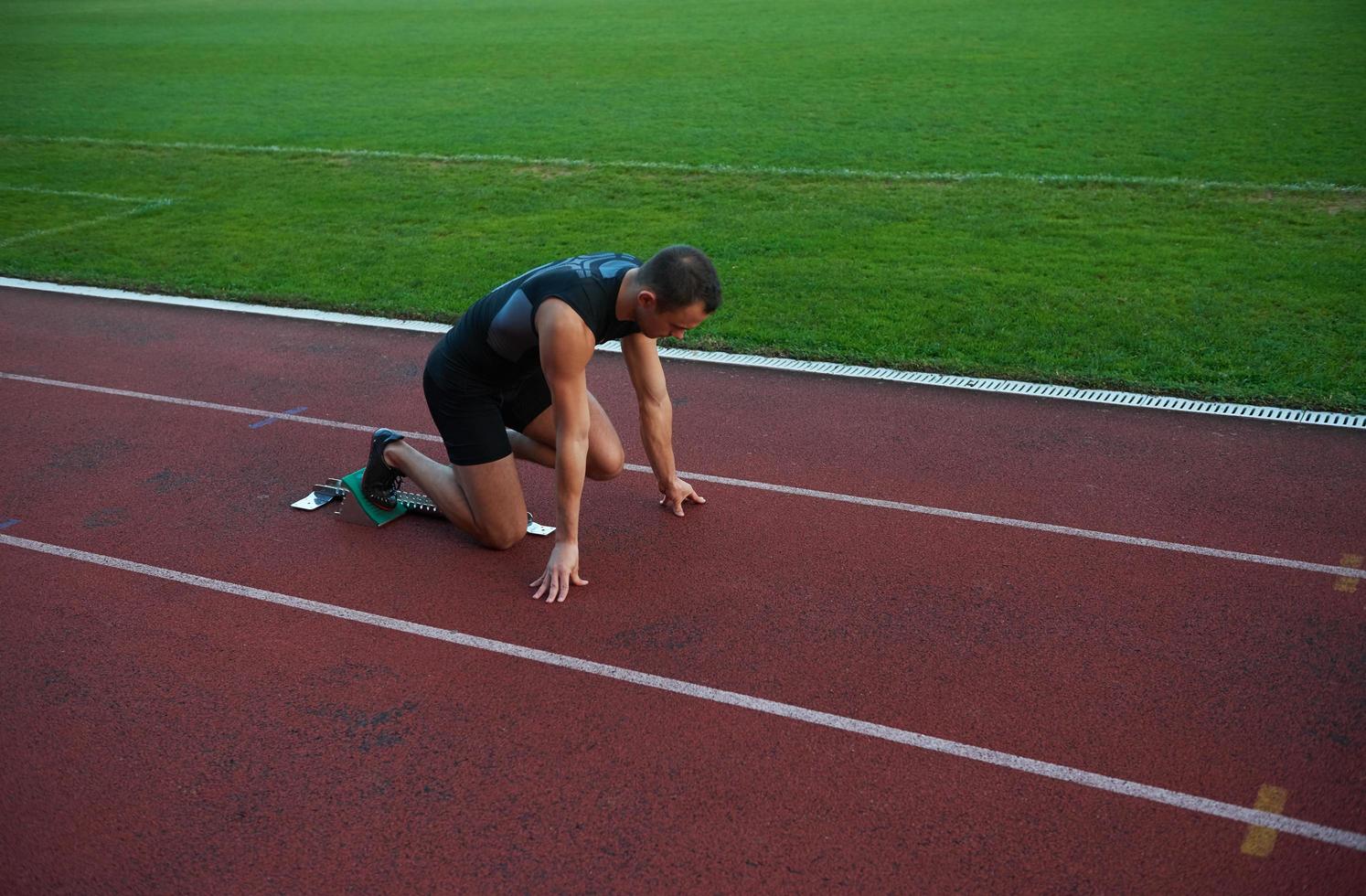 Athletic man start photo