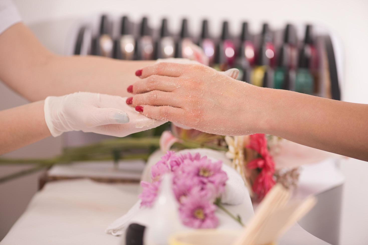 Woman hands receiving a manicure photo