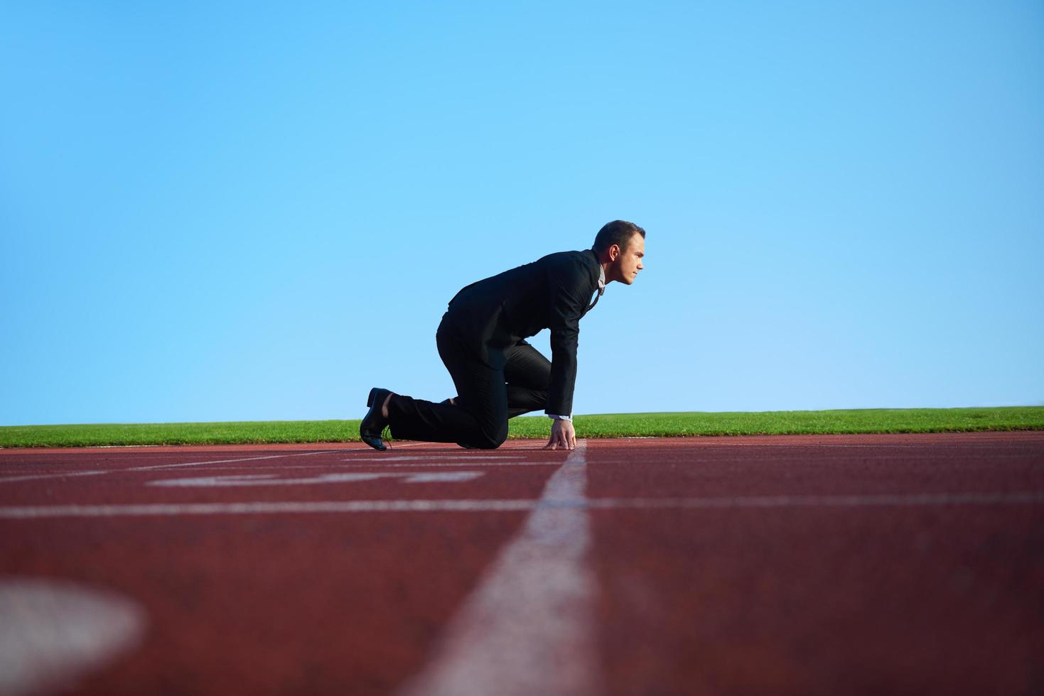 business man ready to sprint photo