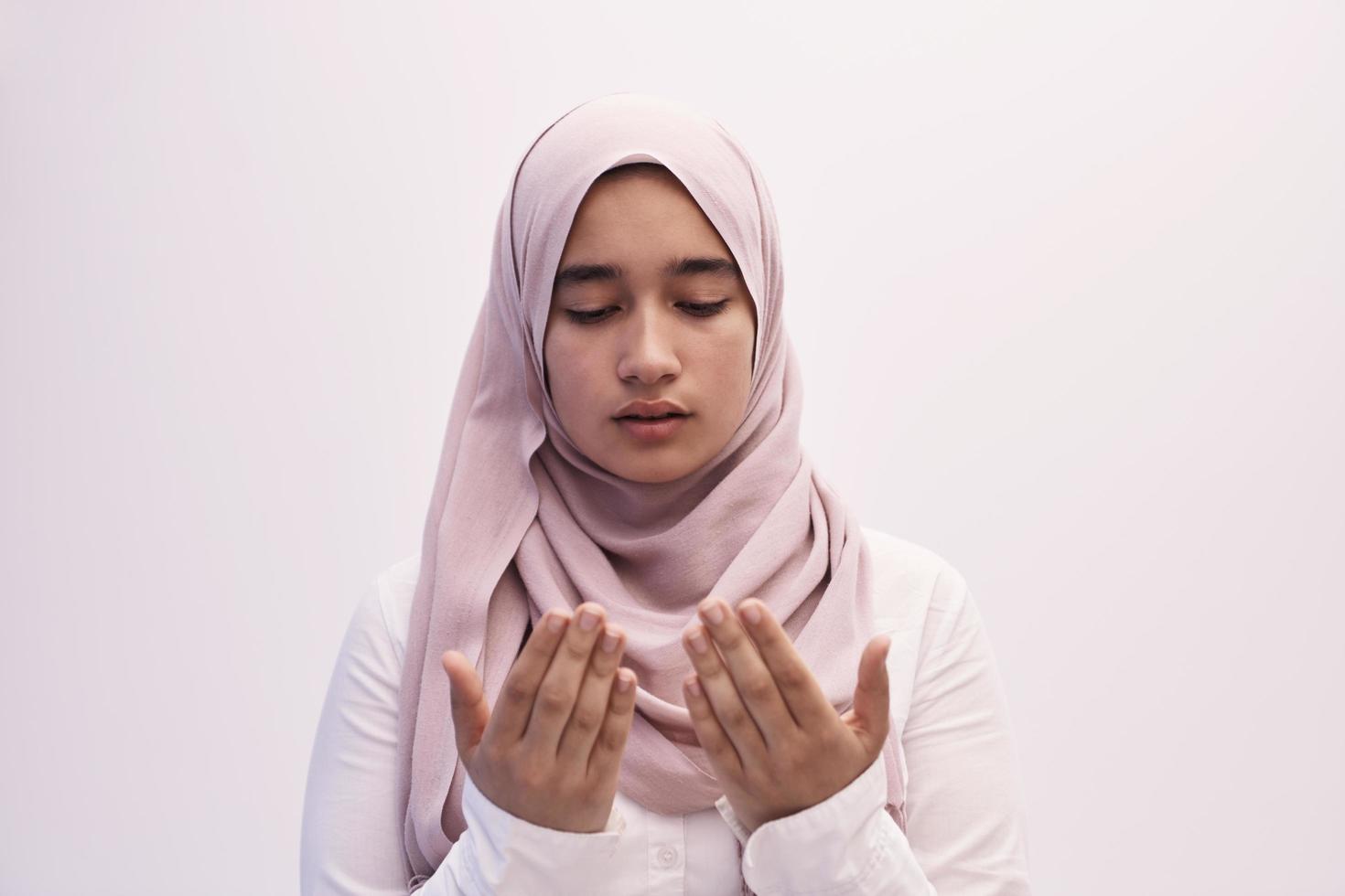 female muslim praying with opend hands photo