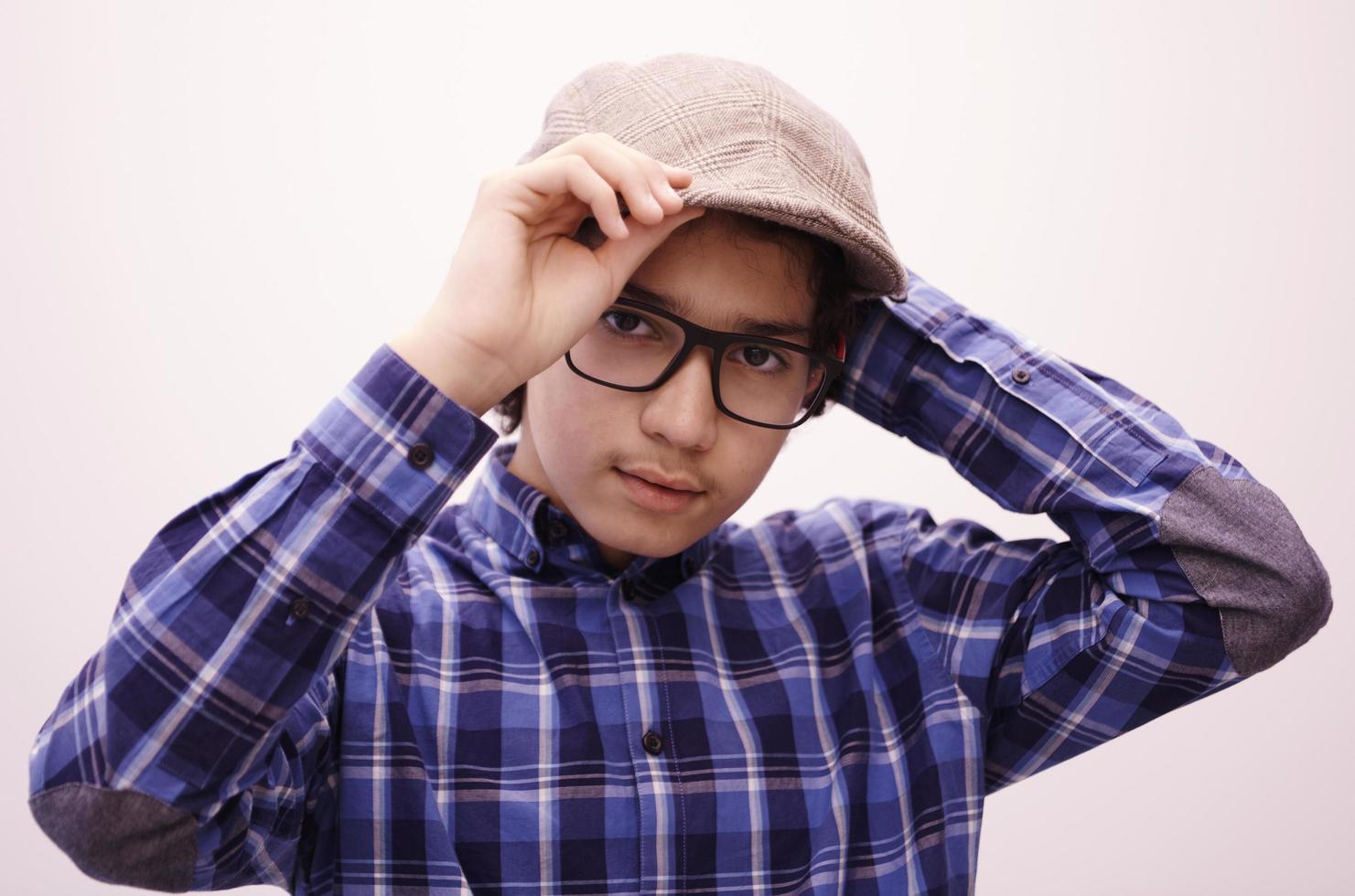 portrait  of smart looking arab teenager with glasses photo