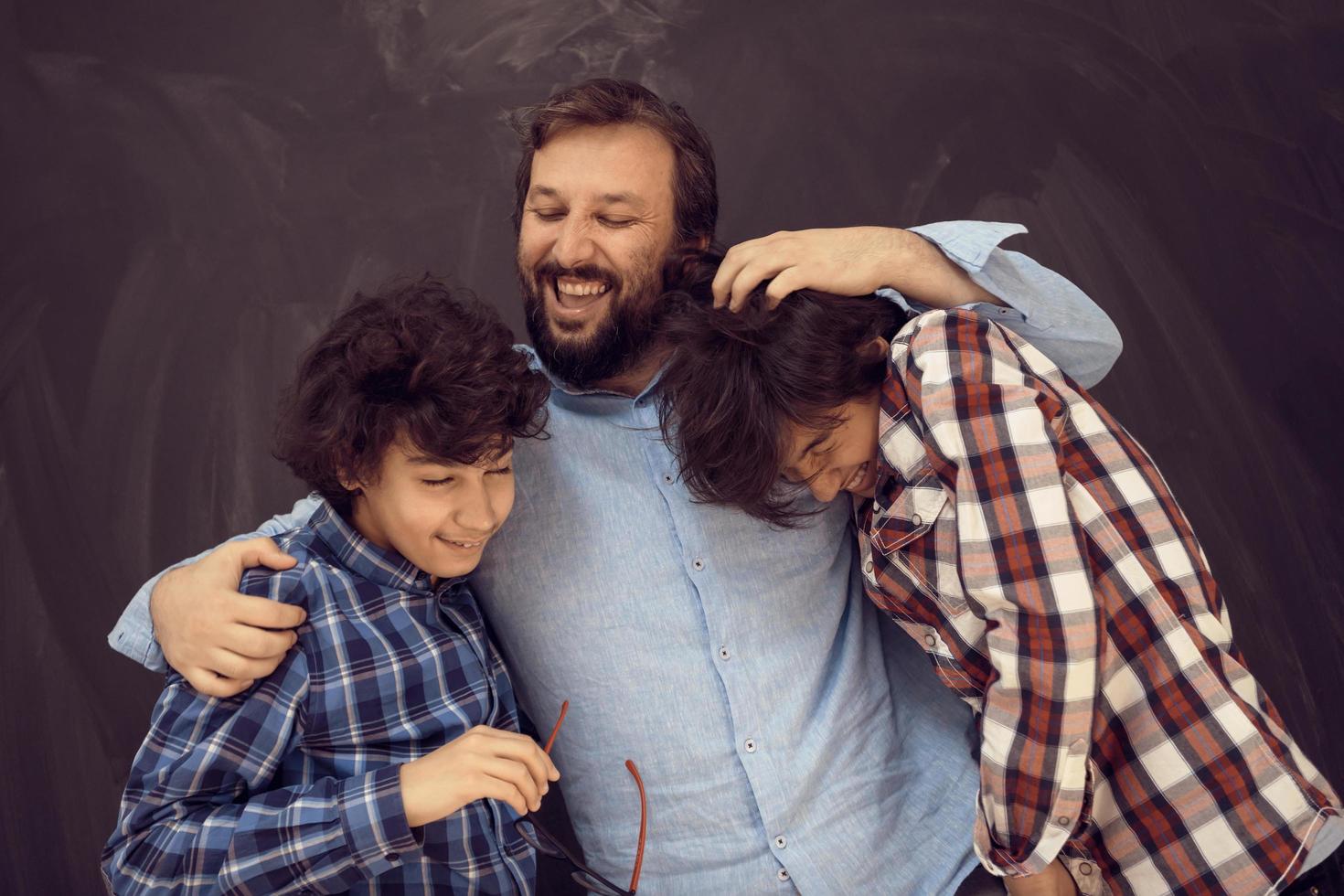 happy father hugging sons unforgetable moments of family joy in mixed race middle eastern arab family photo