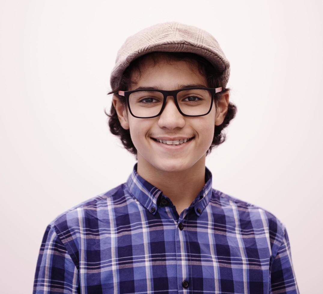 portrait  of smart looking arab teenager with glasses photo