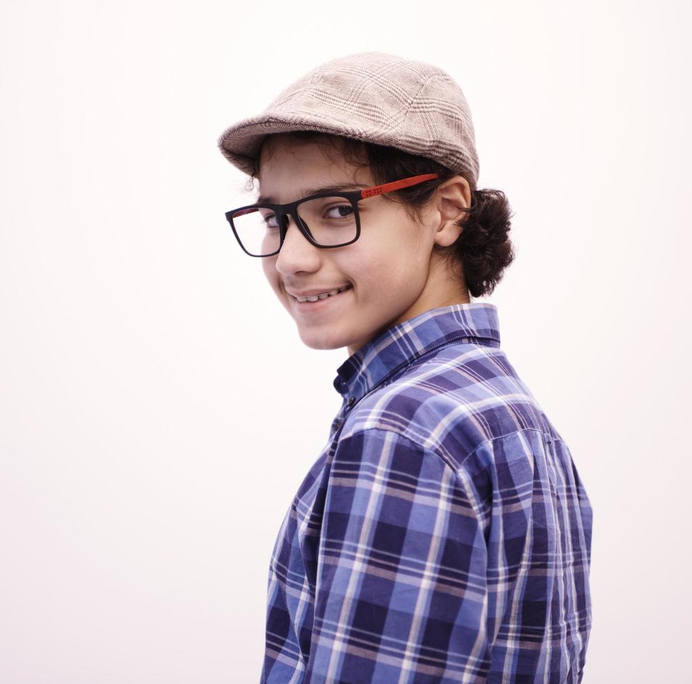 portrait  of smart looking arab teenager with glasses photo