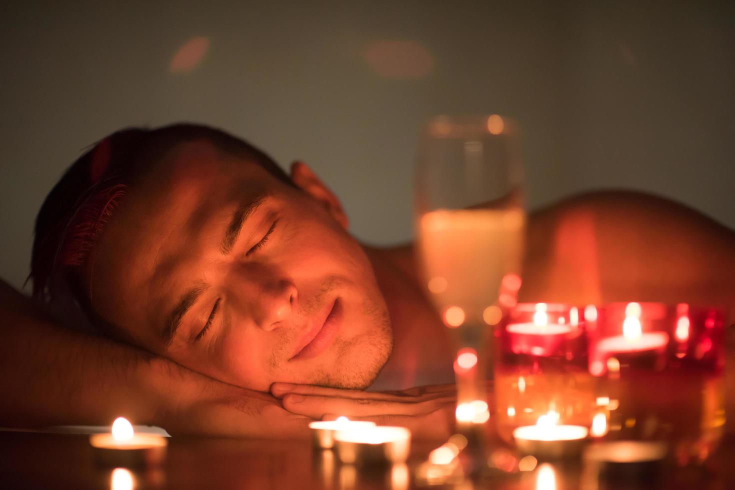 man relaxing in the jacuzzi photo