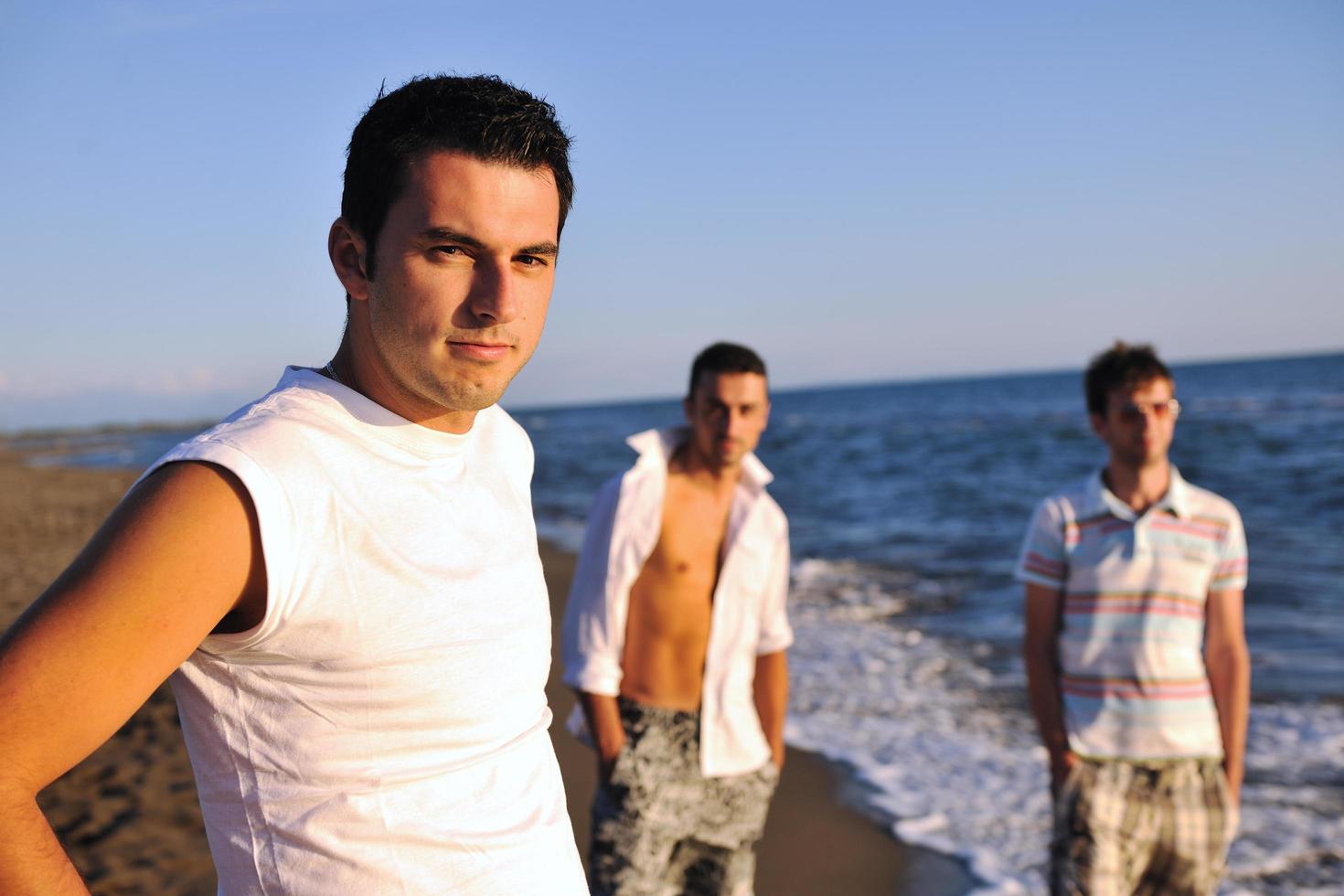 young man at beach photo