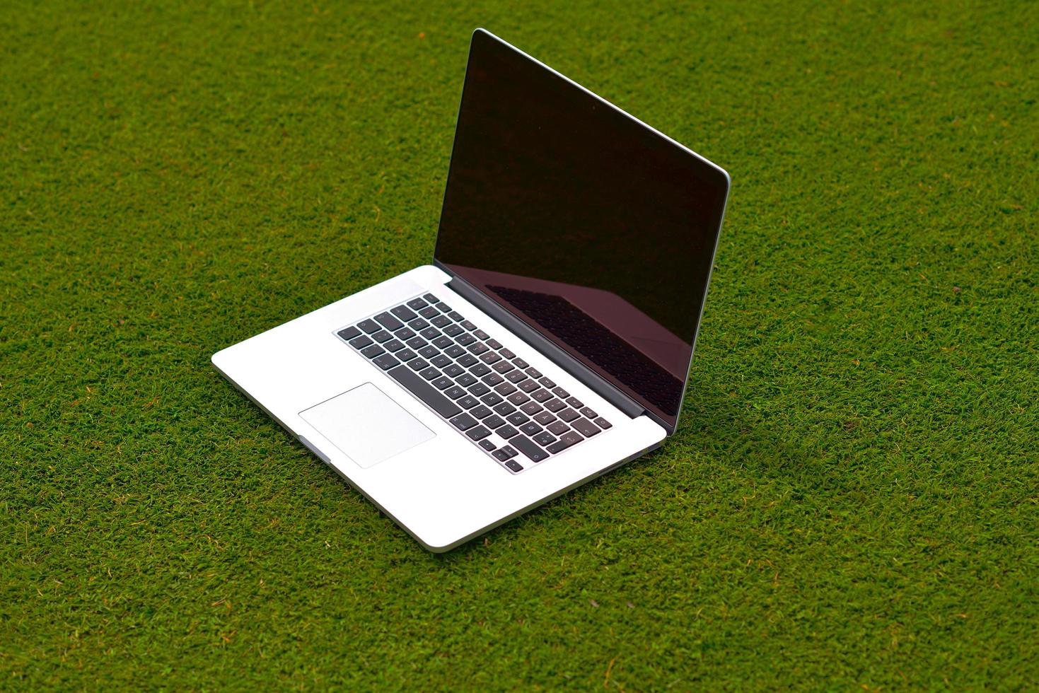laptop computer  on grass photo