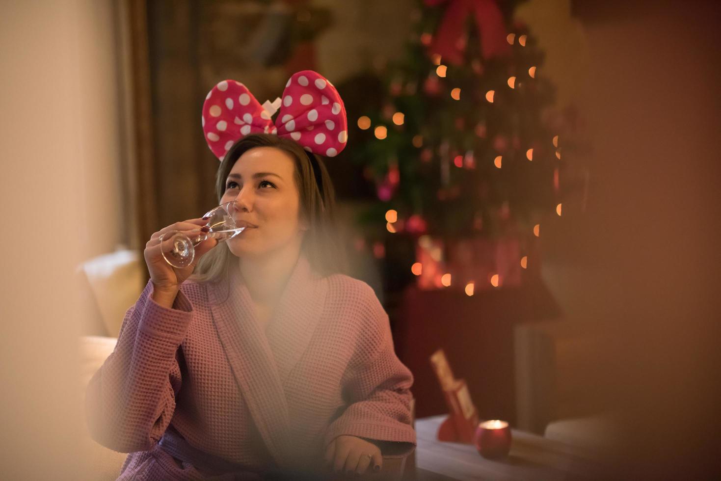 woman drinking champagne at spa photo