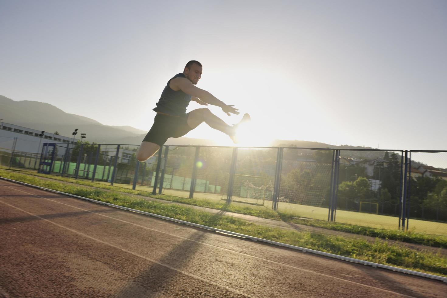 young athlete running photo