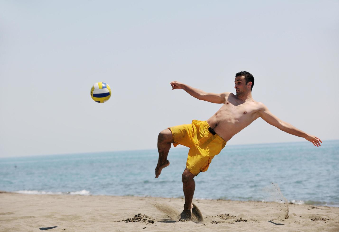 male beach volleyball game player photo