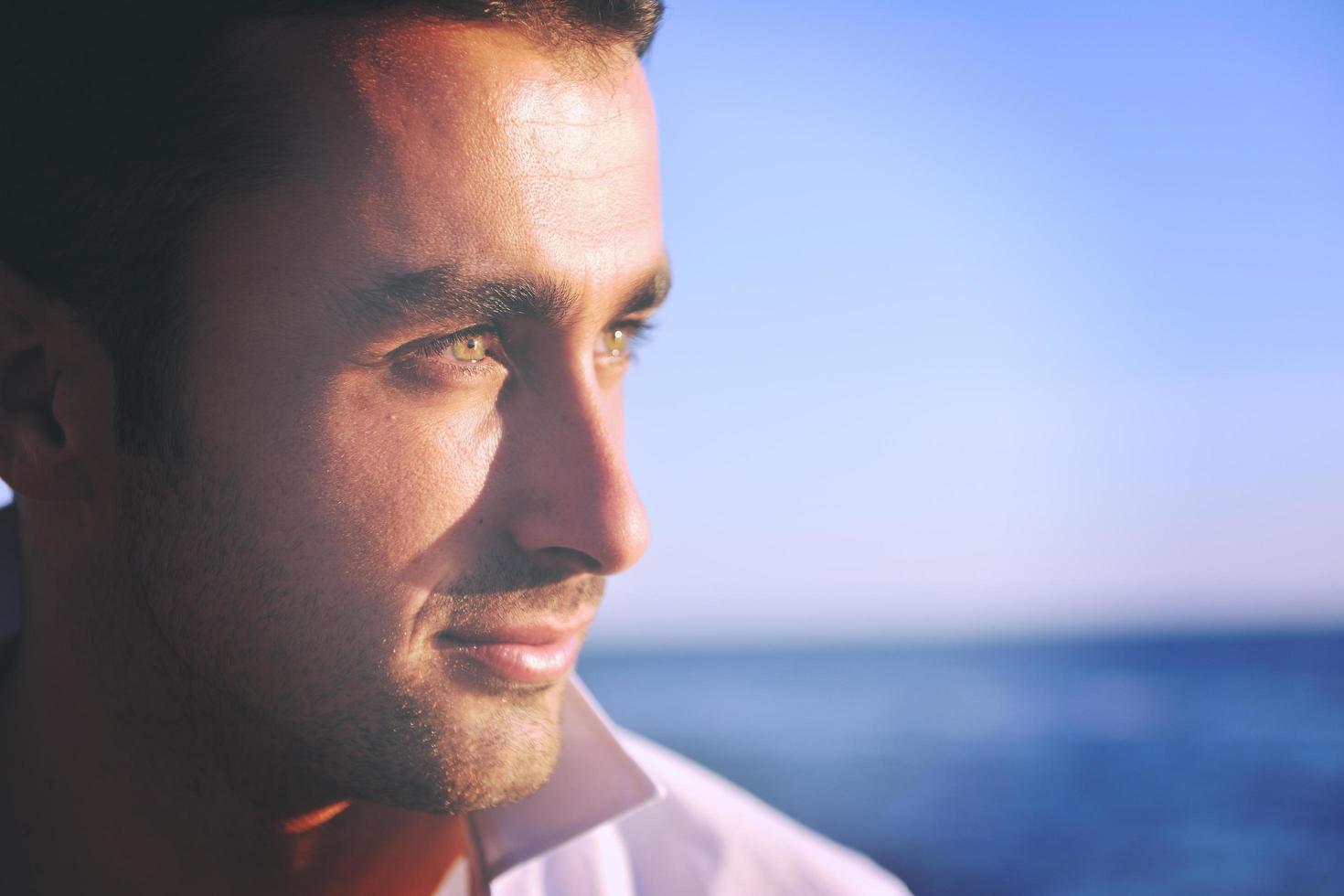young man at beach photo
